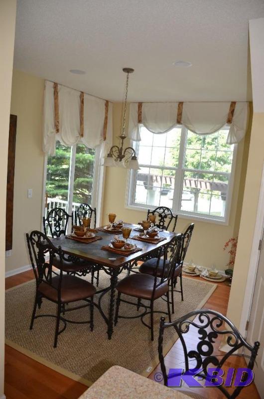 Three lovely window curtains. Two are in the ...