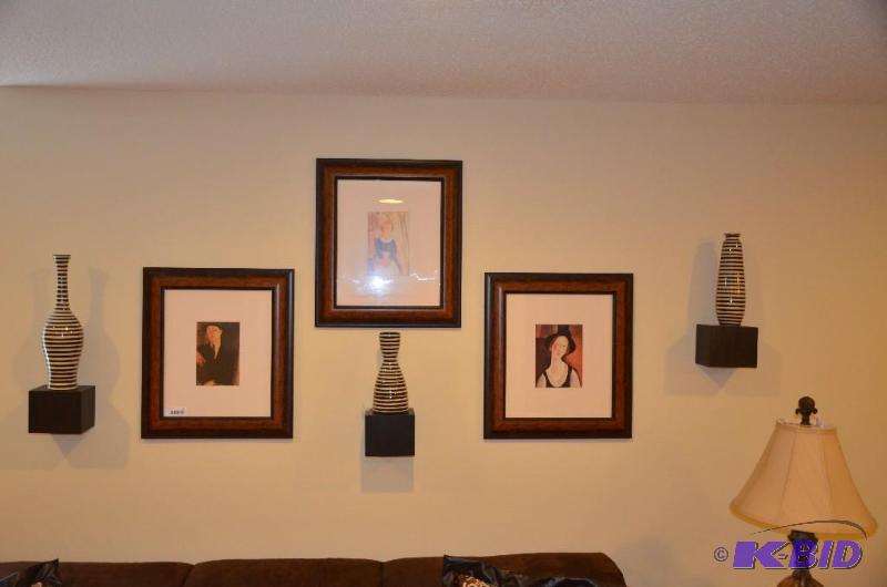 3 pieces of modern wall art each with a vase ...