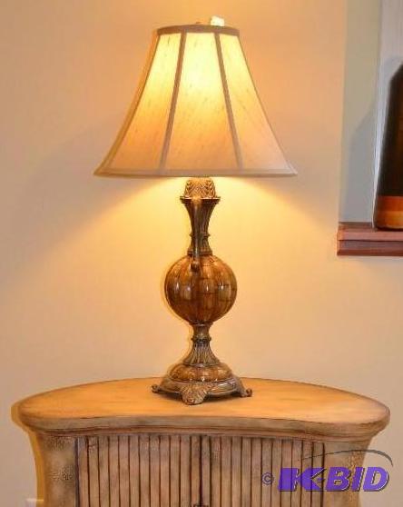 Ornate table lamp matches Lot 40. Approximate...