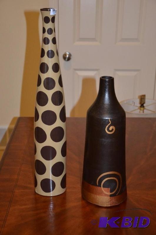 Two modern art vases. One is 24 inches tall a...