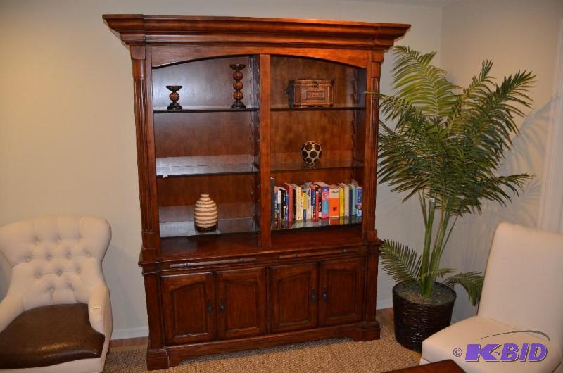 Bookcase with six glass shelves in storage ar...