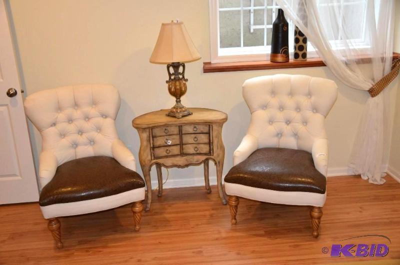 2 white tufted chairs with brown paisley seat...