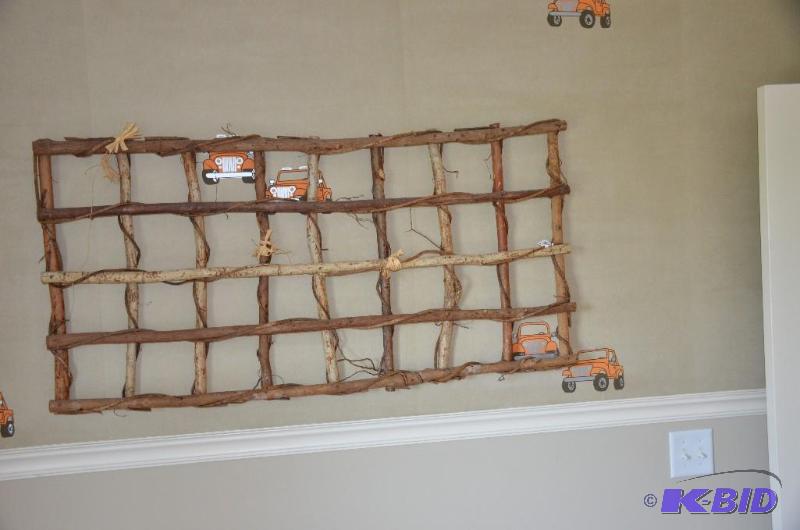 24 x 48 woven wood and vine wall art. It was ...