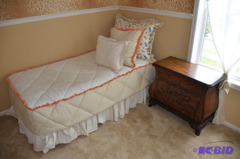 Single bed with cover, pillows, and bed frame...