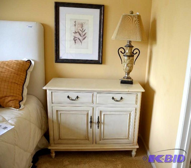 Two-drawer dresser with two front doors with ...