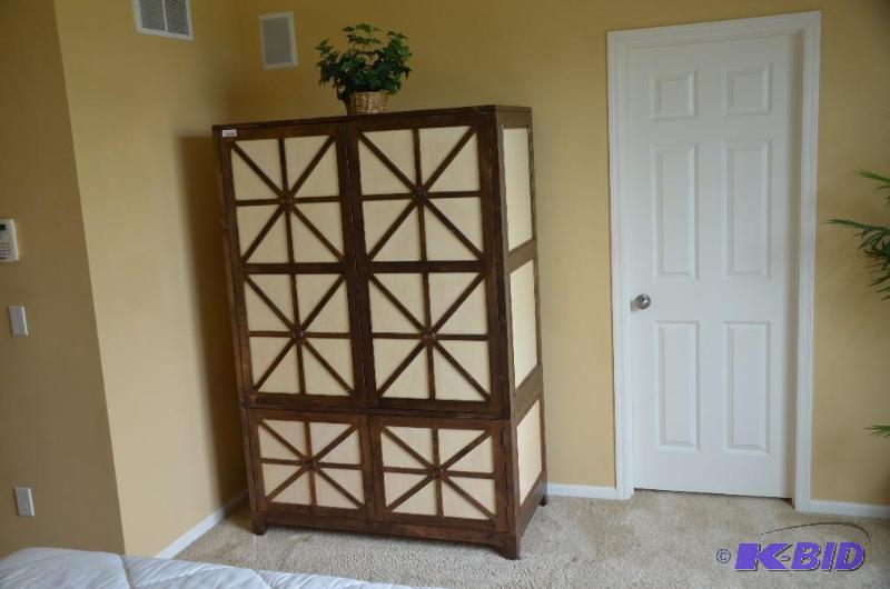 Four-door Armoire. Approximate size is 48 x 7...