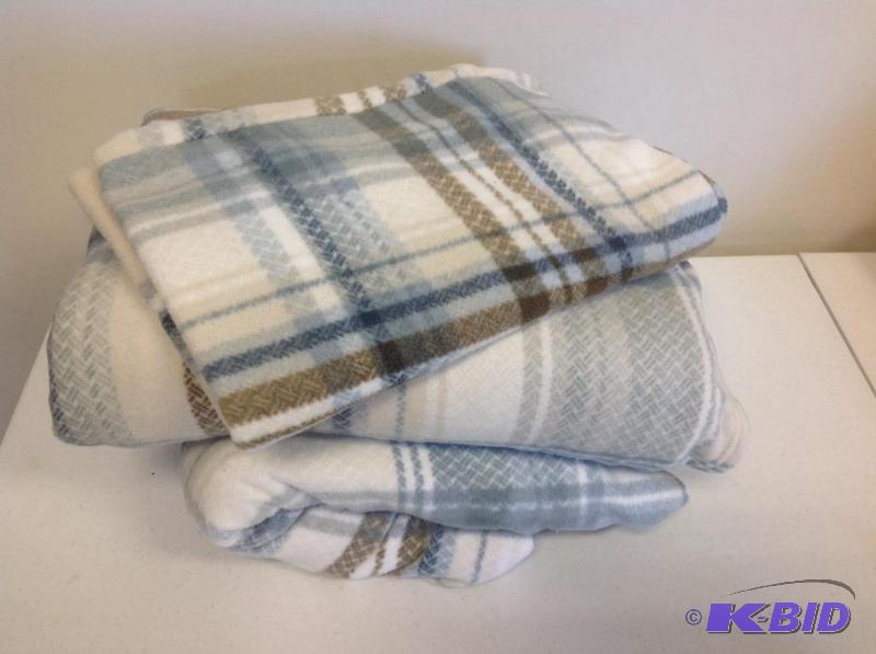 lot 33 image: JC Penny Home Twin Flannel Sheet Set Plaid Cream, Blue, and Brown