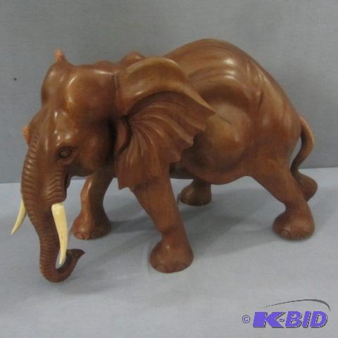 lot 69 image: Bull Elephant, Mango Wood