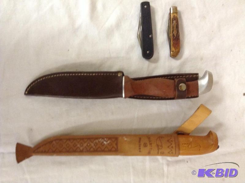 lot 108 image: Fixed and Folding Knives - Rapala, Sabre 
