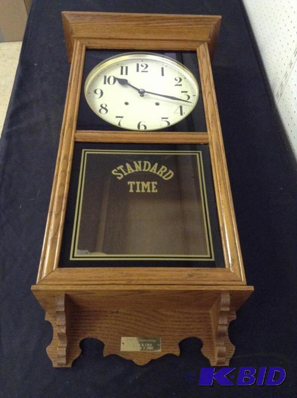 lot 12 image: Standard Time Wooden Wind Up Wall Clock