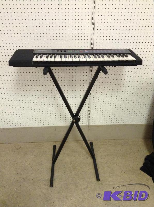lot 84 image: Casio CA-110 Keyboard w Stand