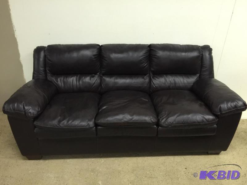 lot 1 image: Chocolate Brown Leather Sofa