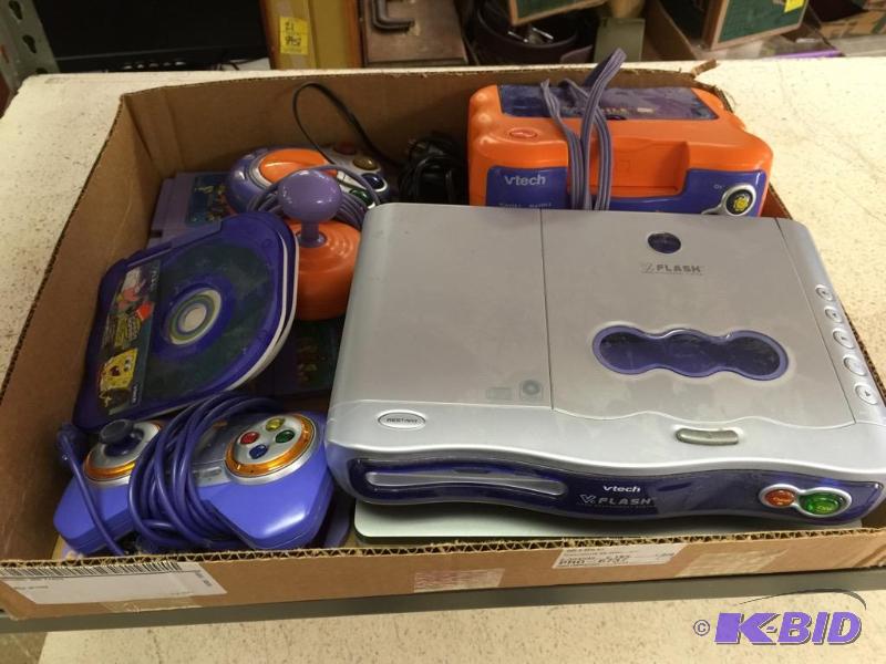 lot 29 image: Multiple V-Tech Machines With Accessories & Games