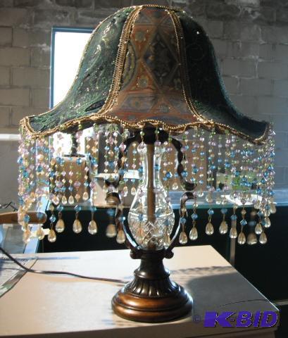 lot 14 image: Decorative Lamp - Has beaded lampshade - Bron...
