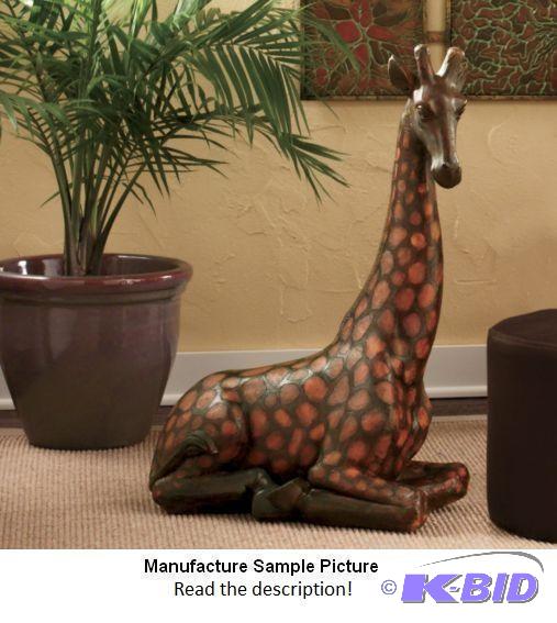 lot 3 image: Giraffe Statue - This charming sculpture capt...