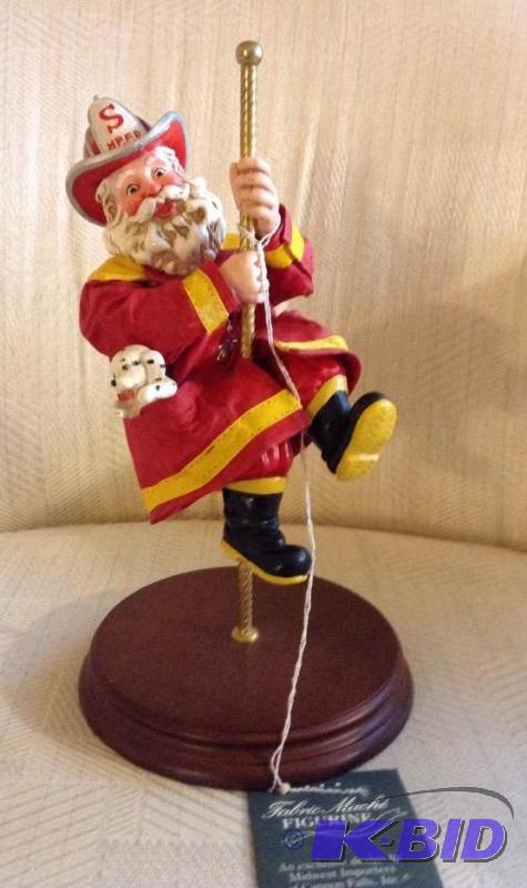 lot 103 image: Fabric Mache by Midwest Importers North Pole Fire Department Santa