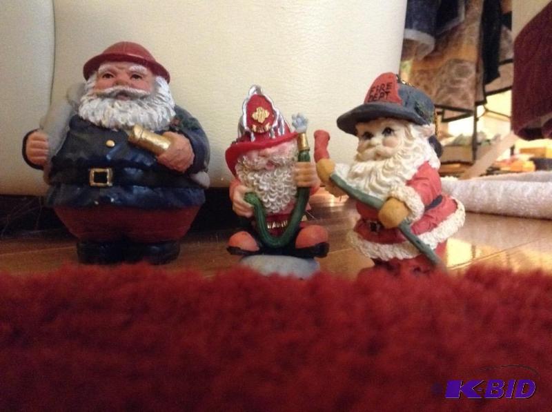 lot 105 image: Set of Three Smaller Santa Firefighter Figurines