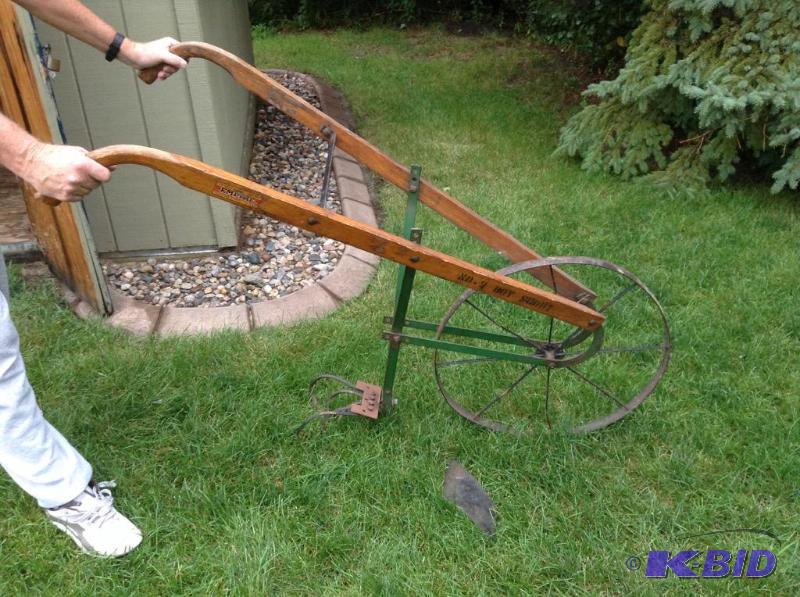 lot 152 image: Antique Steel Wheeled PlowCultivator