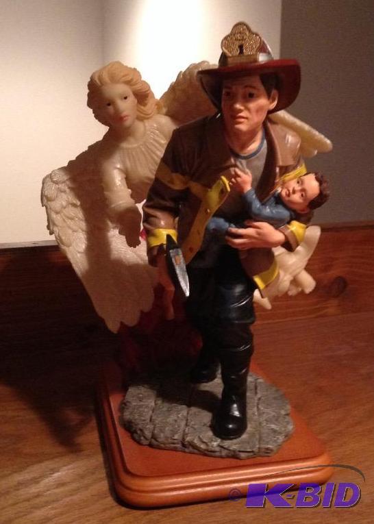 lot 41 image: Red Hats of Courage Firefighter Figurine