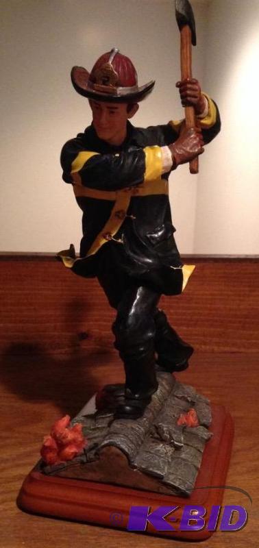 lot 42 image: Red Hats of Courage Firefighter Figurine
