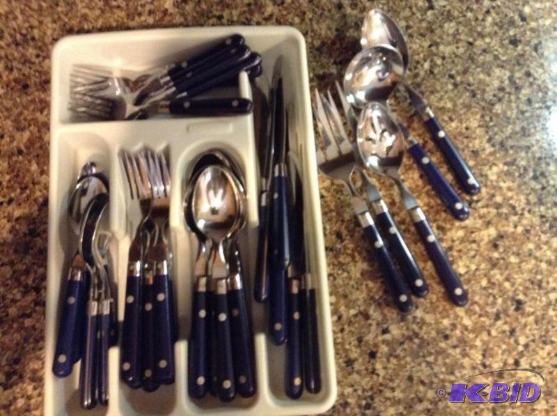 lot 73 image: Blue Handled Flatware Set and Serving Pieces