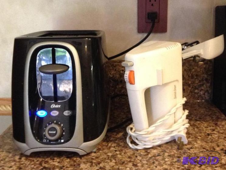 lot 80 image: Small Kitchen Electrics - Black & Decker Hand Mixer - Oster Toaster