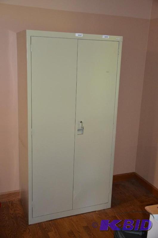 lot 100 image: Metal 2 door storage cabinet in computer room...
