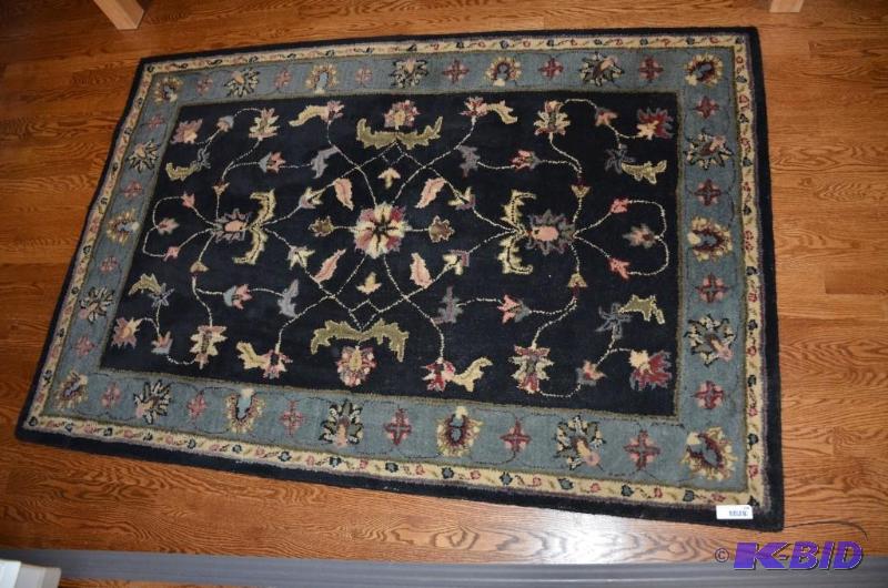 lot 106 image: Area Rug 72x48...
