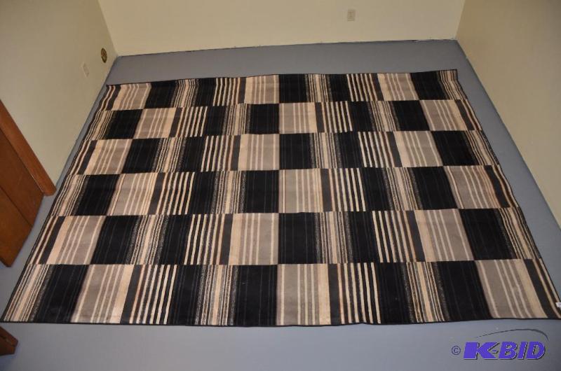 lot 108 image: Large modern area rug with non slip pad, appr...