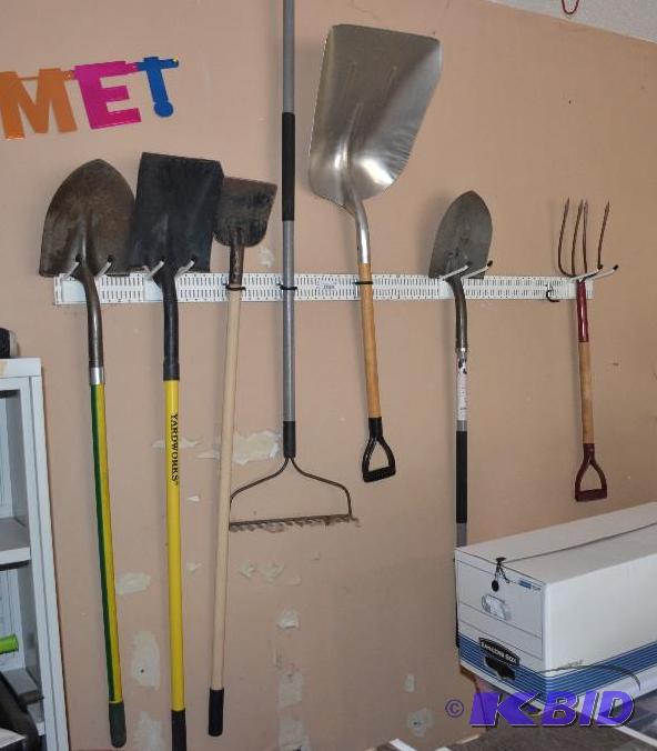 lot 154 image: Lot of Yard tools hanging on white bar & ...