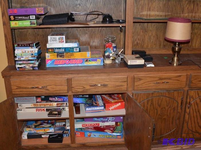 lot 197 image: Large group of games and a desk lamp...