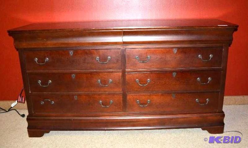 lot 20 image: 8 Drawer &nbspwood dresser by&nbspBasset&nb...