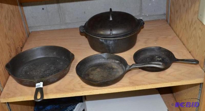 lot 35 image: GRISWOLD Cast Iron skillet & misc pots. G...
