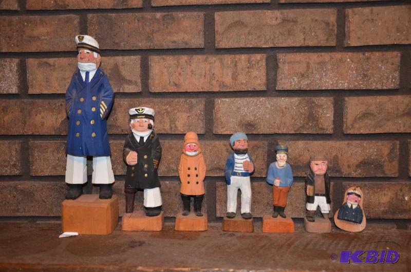 lot 49 image: Popeye wood carvings. The tallest is 12"...