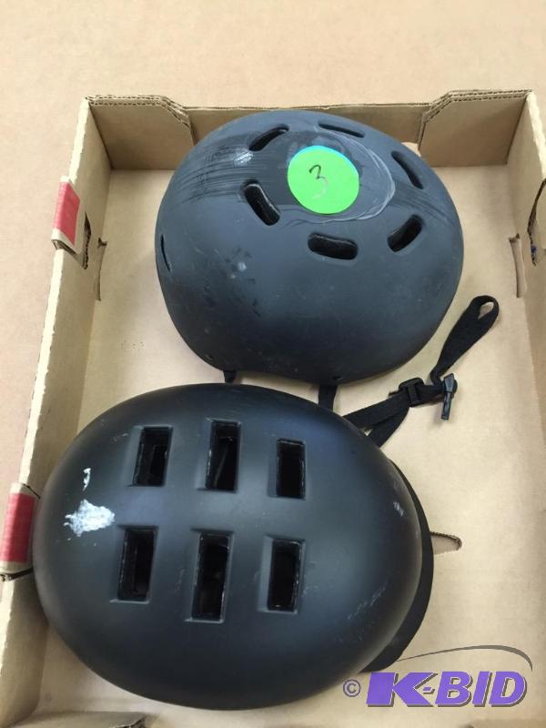 lot 3 image: Two bell bicycle helmets for kids