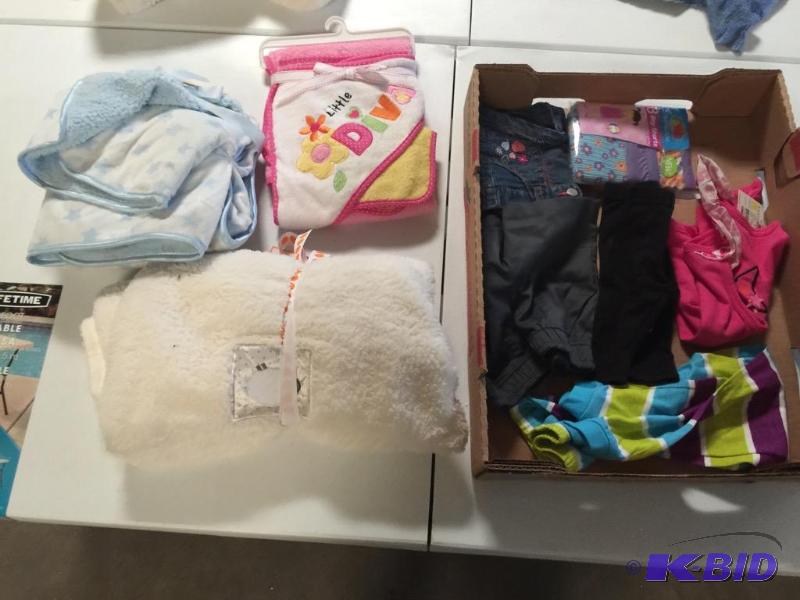 lot 40 image: Baby stuff with clothing