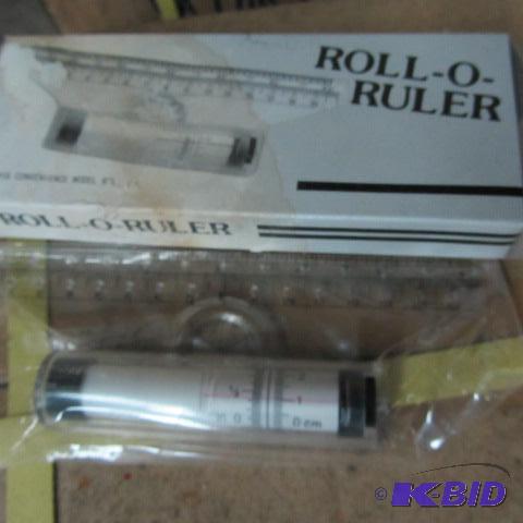lot 521 image: Roll-O-Ruler