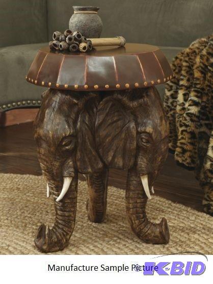 Elephant Table - Elephants hold a faux leathe...