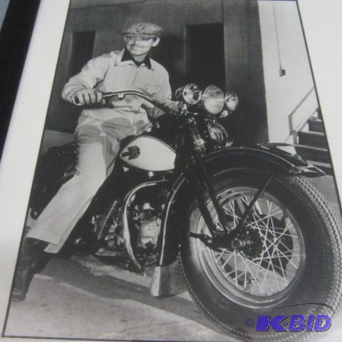 lot 117 image: Clark Gable on a Harley
