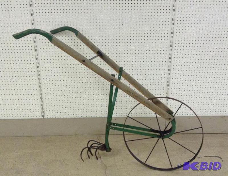 lot 12 image: Old Montgomery Ward Wheeled Cultivator