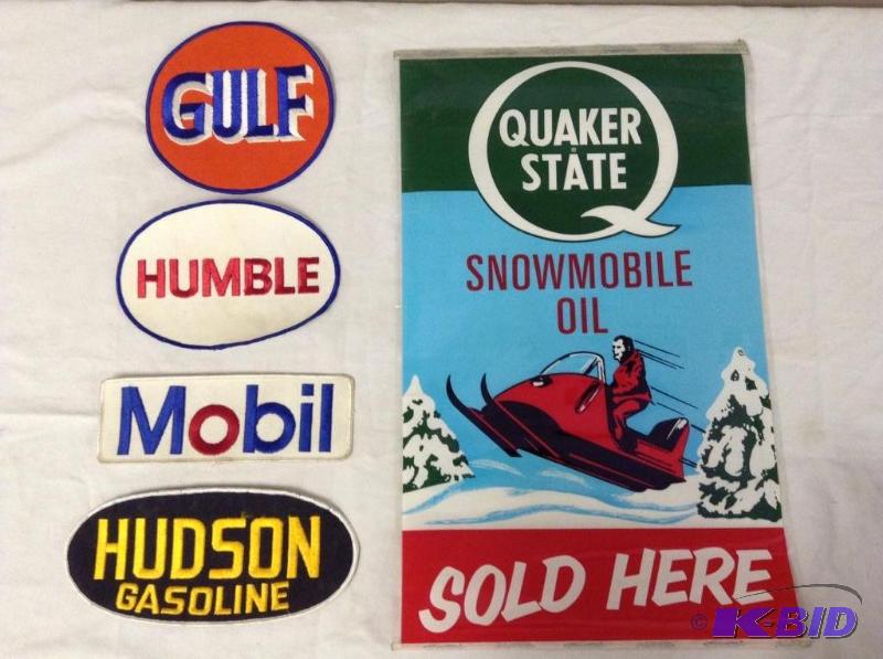 lot 30 image: Filling Station Patches and Roll-up Ad for Quaker State