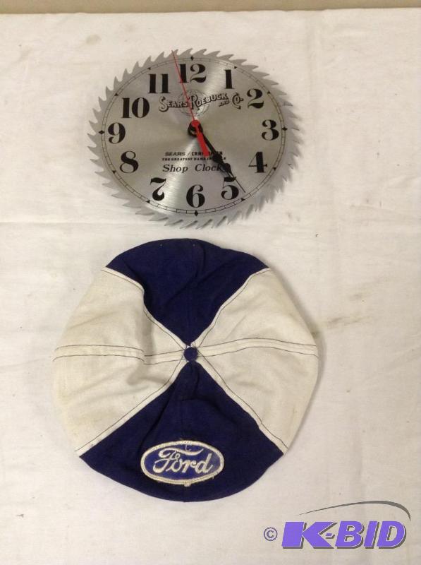 lot 63 image: Craftsman Saw Blade Clock and Ford Hat