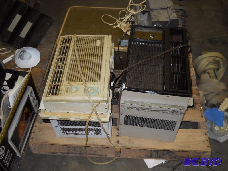 lot 24 image: White Air Conditioner On The Left
