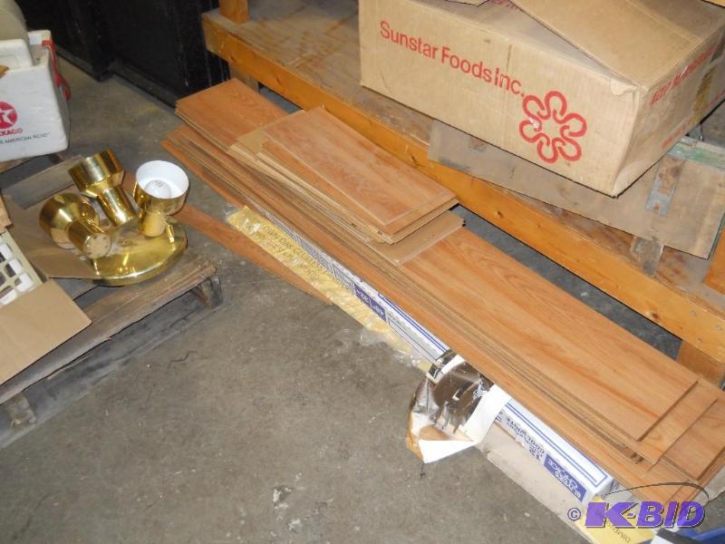 lot 27 image: Pile of Wood Flooring and Light