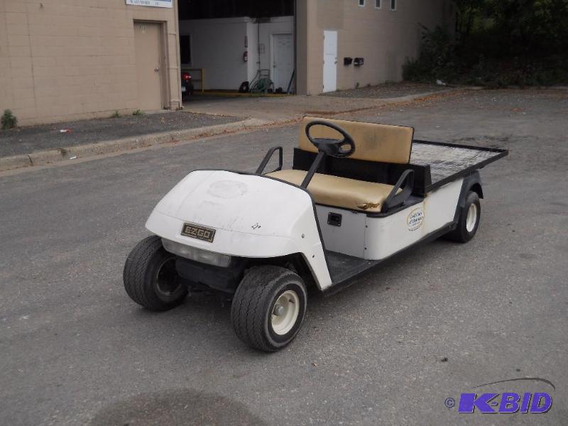 lot 7 image: EZ-GO Utility Golf Cart. Starts, Runs and Drives.