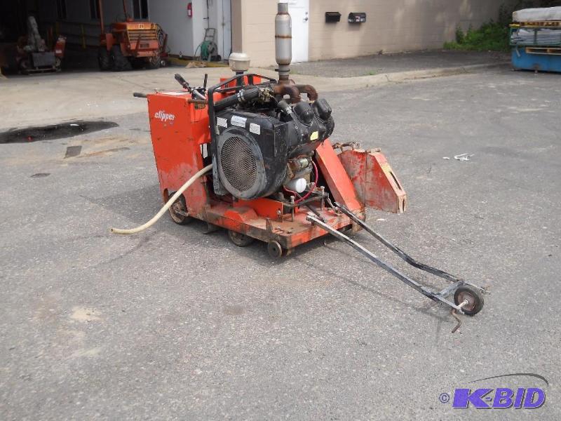 lot 5 image: Norton Clipper C-65B Concrete Saw. Runs. NO RESERVE.