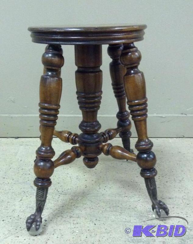 lot 7 image: Solid Wood Claw Foot Piano Stool
