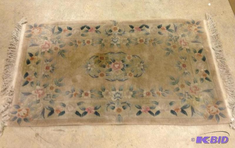 lot 82 image: Floral Wool Rug with Fringe