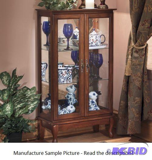 Two Door Lighted Cabinet - Oak - This two-doo...