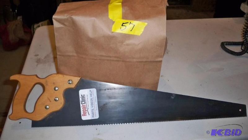 NEW HAND SAW AND BAG OF MISCELLANEOUS...